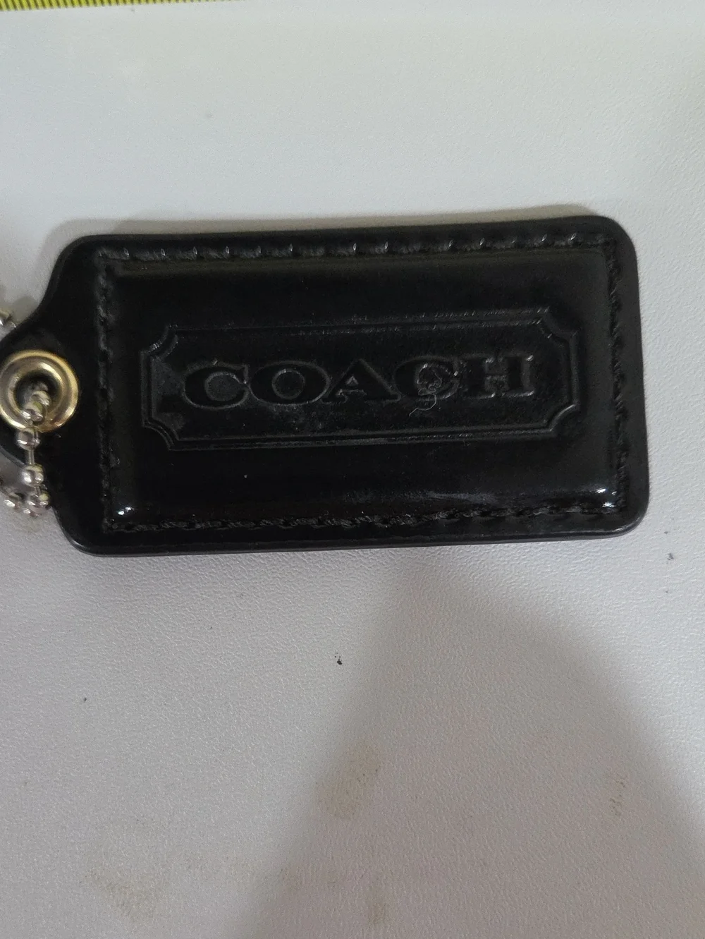Coach Black Embossed Leather Hang Tag with Metal Ring